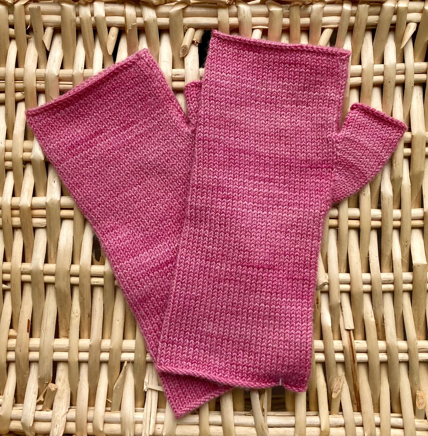 Pink fingerless gloves